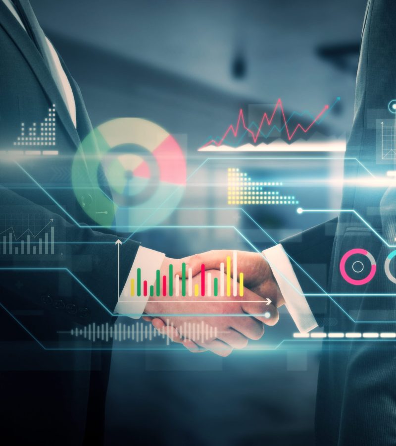 businessmen-shaking-hands-with-digital-business